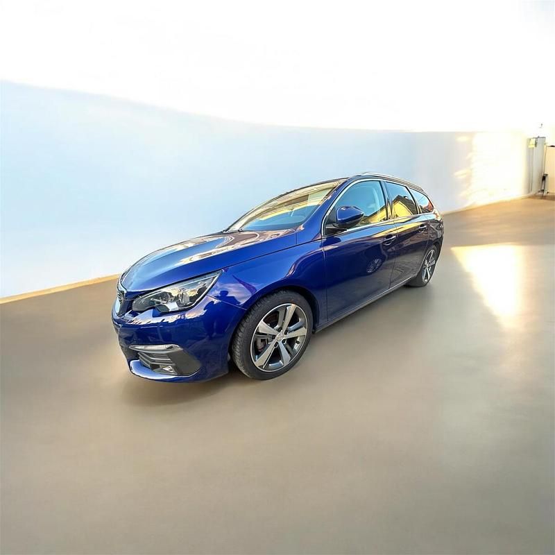 Azul Usado 2018 Peugeot 308 SW Allure Carrinha | € 14.900 - Imagem 1/4