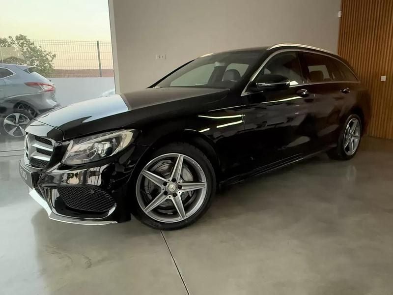 Usado Mercedes C200 AMG line 136 HP (100 kW) 2015 Preto Carrinha