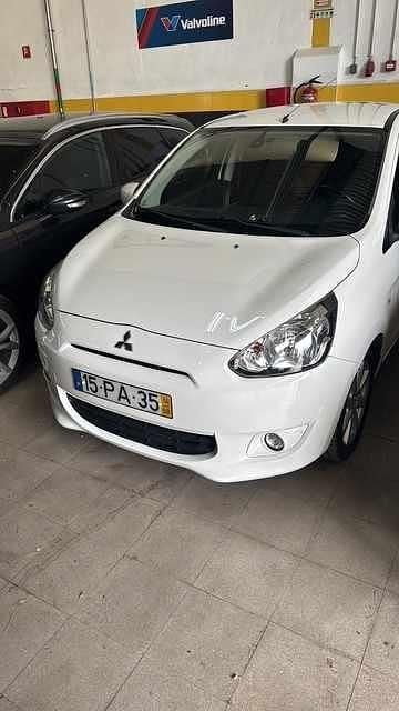 Usado Mitsubishi Space Star 80 HP (58 kW) 2014 Branco Citadino