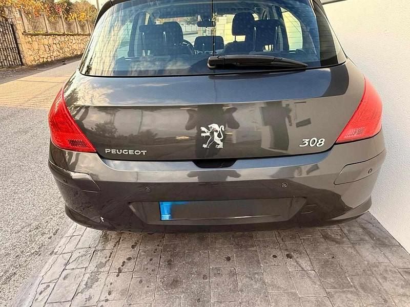 Usado Peugeot 308 90 HP (66 kW) 2008 Cinzento Citadino