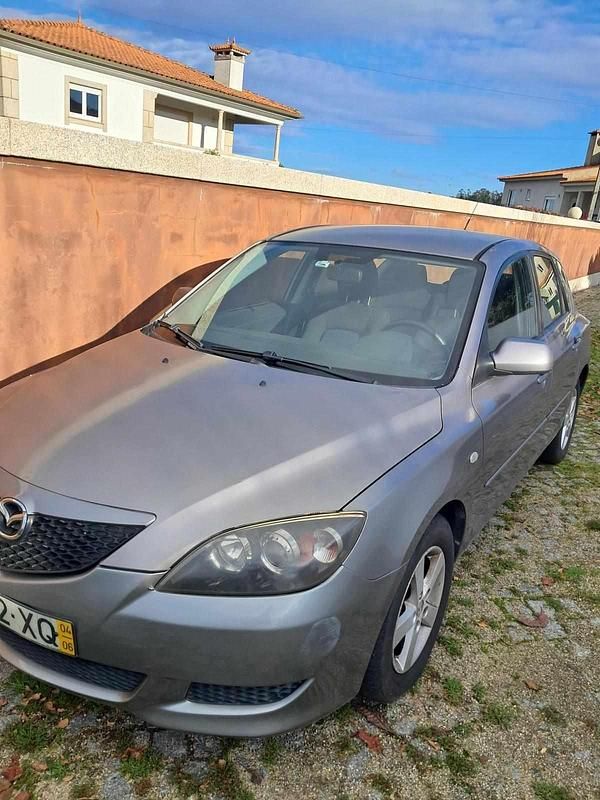 Usado Mazda 3 84 HP (61 kW) 2004 Cinzento Citadino