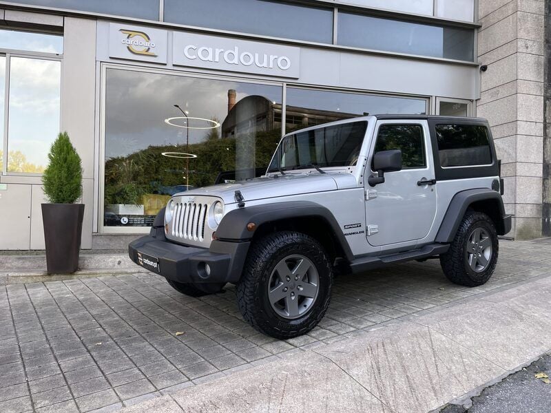 Usado Jeep Wrangler Sport 200 HP (147 kW) 2012 Cinzento preto SUV