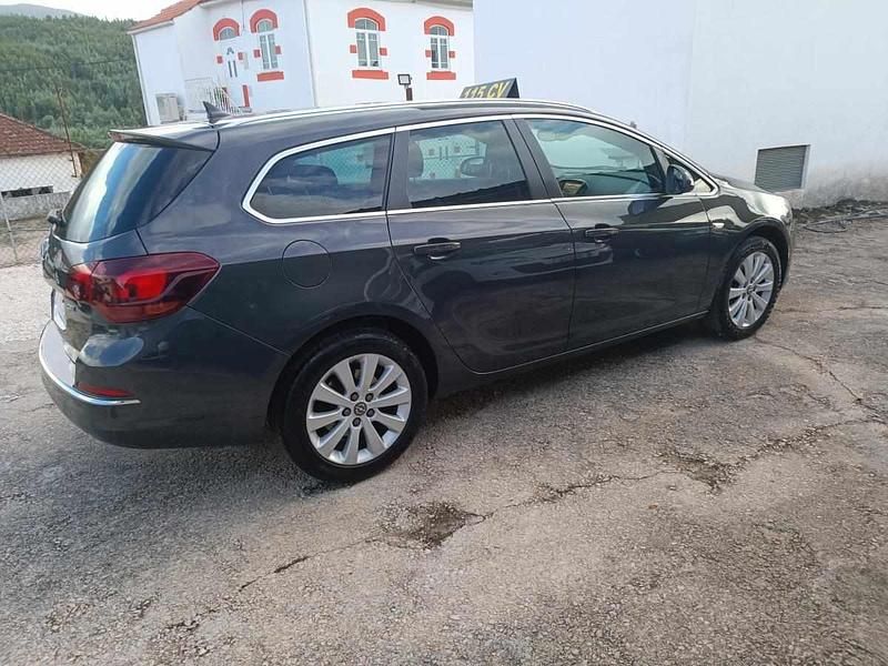 Usado Opel Astra Sport 110 HP (80 kW) 2015 Cinzento Carrinha