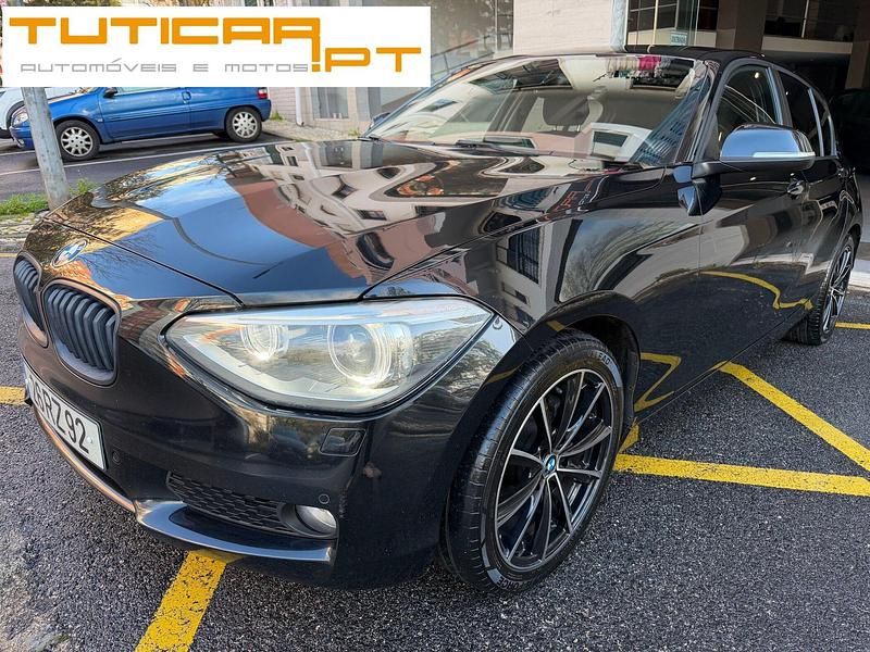 Preto Usado 2012 BMW 116 Efficient Dynamics Citadino | € 13.900 - Imagem 1/4