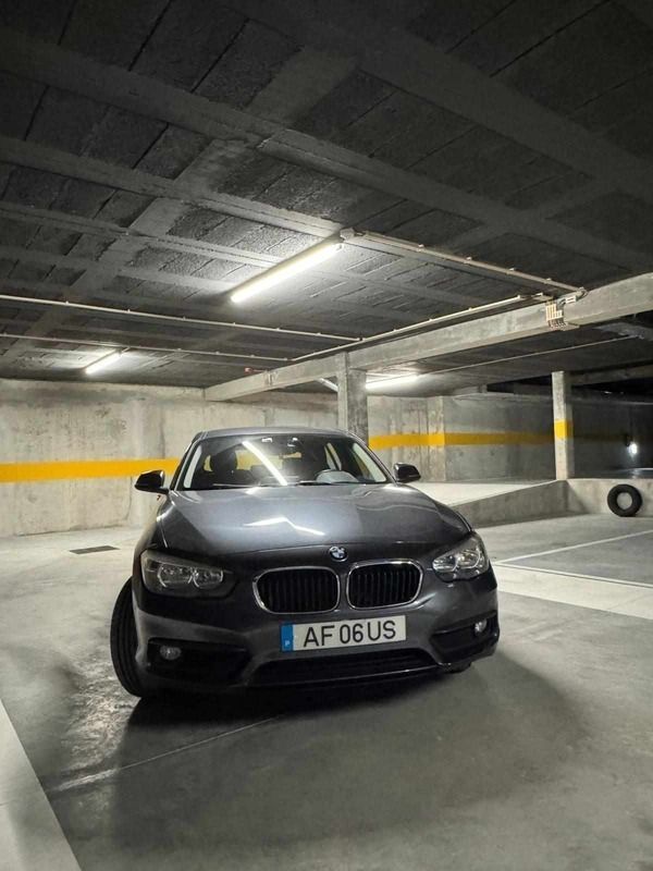 Cinzento Usado 2016 BMW 114 Citadino | € 13.500 (Preço justo) - Imagem 1/4