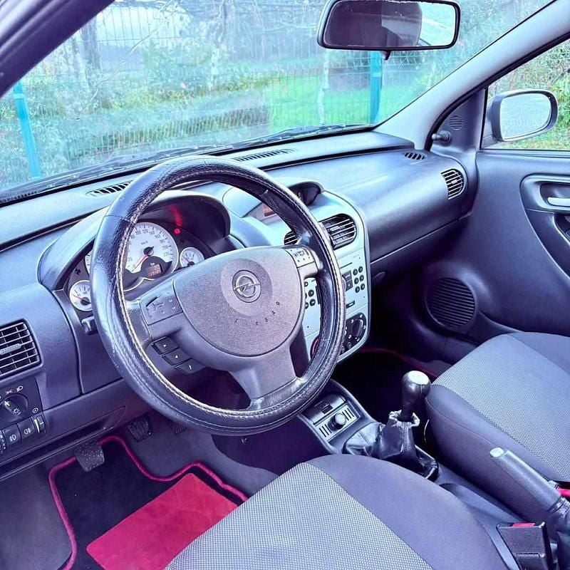 Usado Opel Corsa 75 HP (55 kW) 2006 Cinzento Citadino