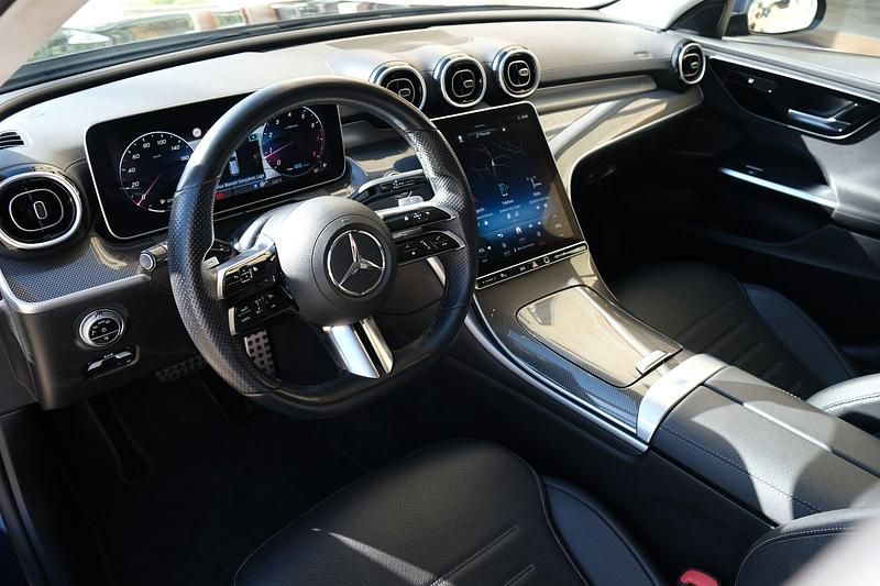 Usado Mercedes C200 AMG line 204 HP (150 kW) 2022 Azul Carrinha