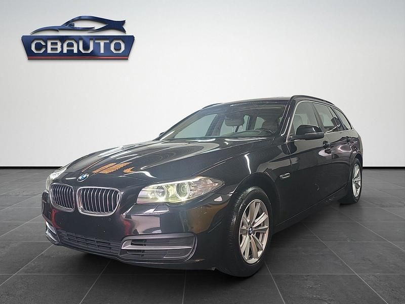 Preto Usado 2015 BMW 518 Performance Carrinha | € 17.750 - Imagem 1/4