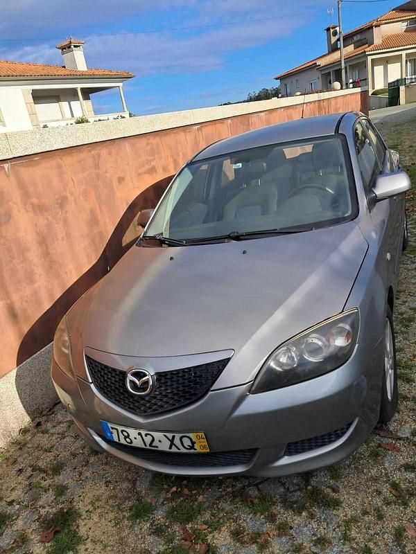 Usado Mazda 3 84 HP (61 kW) 2004 Cinzento Citadino