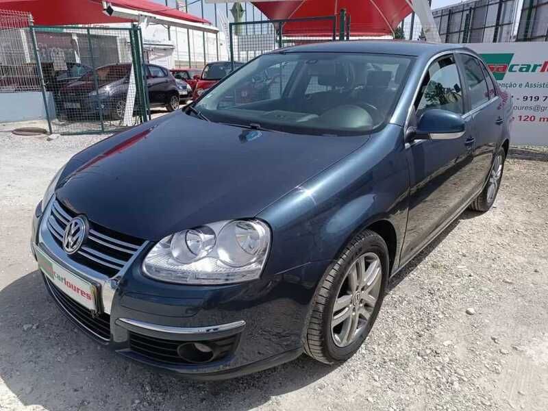 Cinza Usado 2010 VW Jetta Sedan | € 7.850 (Bom preço) - Imagem 1/4