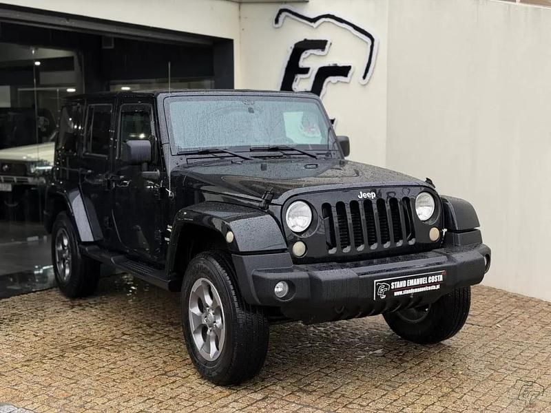 Verde escuro Usado 2012 Jeep Wrangler Unlimited Sahara SUV | € 42.000 - Imagem 1/4