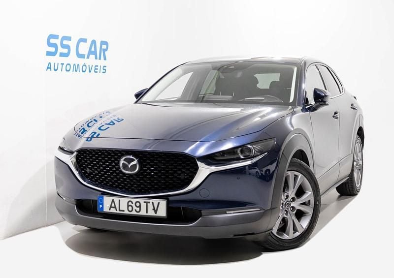 Azul Usado 2021 Mazda CX-30 Exclusive-Line SUV | € 17.990 - Imagem 1/4