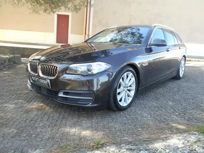 Castanho Usado 2017 BMW 520 Luxury Line Carrinha | € 19.990 (Bom preço) - Imagem 1/4