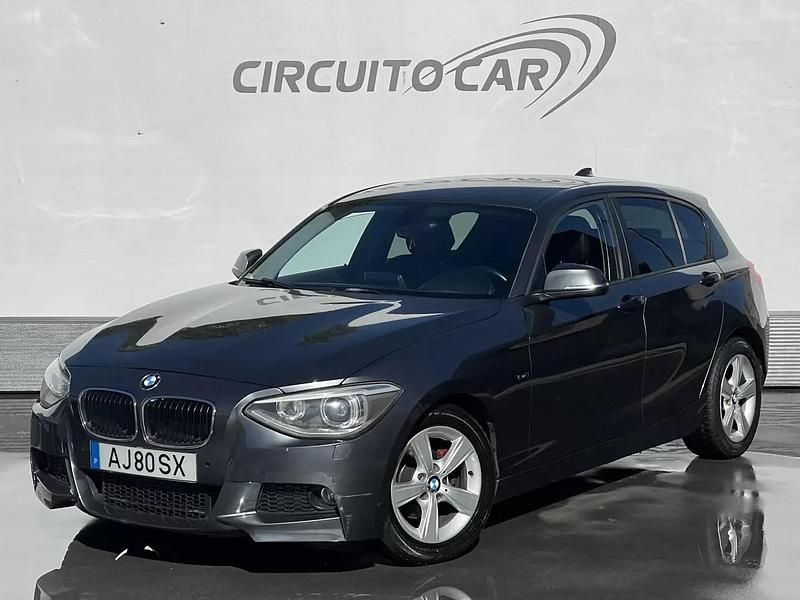 Cinzento Usado 2012 BMW 116 Sport Line Citadino | € 9.900 (Preço justo) - Imagem 1/4