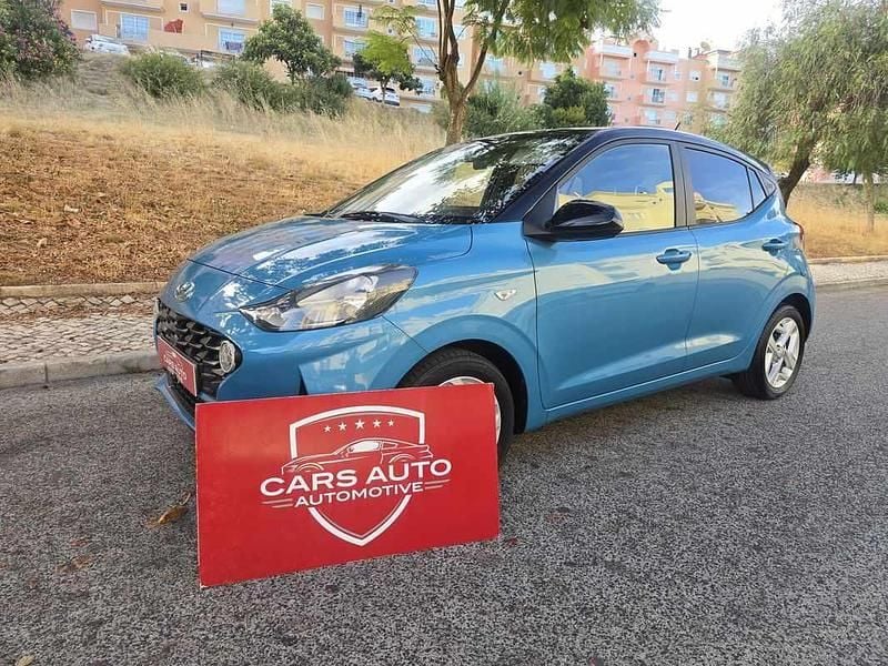 Azul Usado 2020 Hyundai i10 Comfort Citadino | € 12.890 (Preço justo) - Imagem 1/4