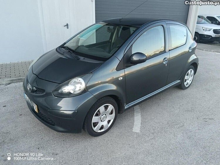 Cinza Usado 2009 Toyota Aygo Cool Citadino | € 5.990 (Preço justo) - Imagem 1/1