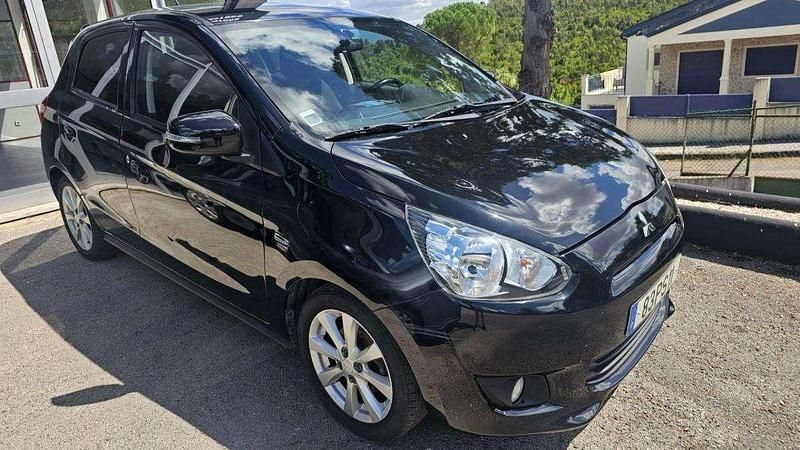 Preto Usado 2015 Mitsubishi Space Star | € 6.900 - Imagem 1/4