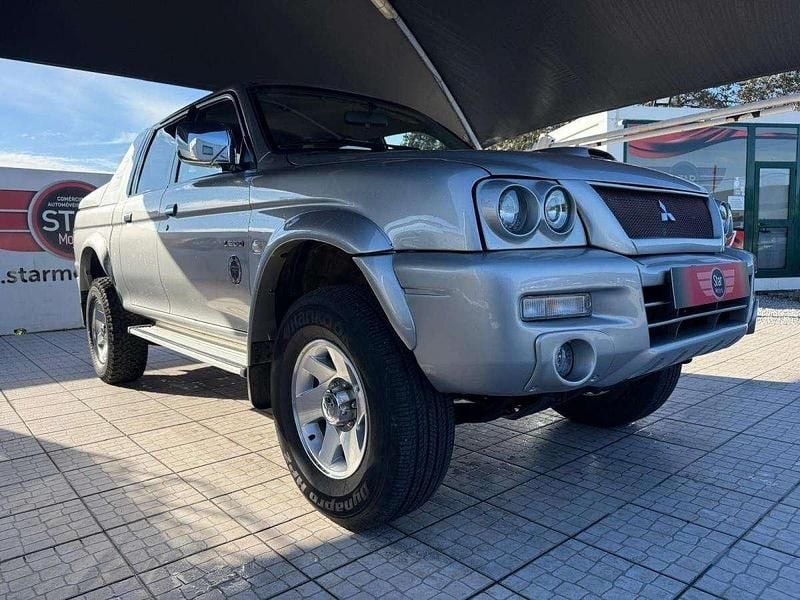 Cinzento Usado 2004 Mitsubishi L200 Pickup | € 17.950 (Preço justo) - Imagem 1/4