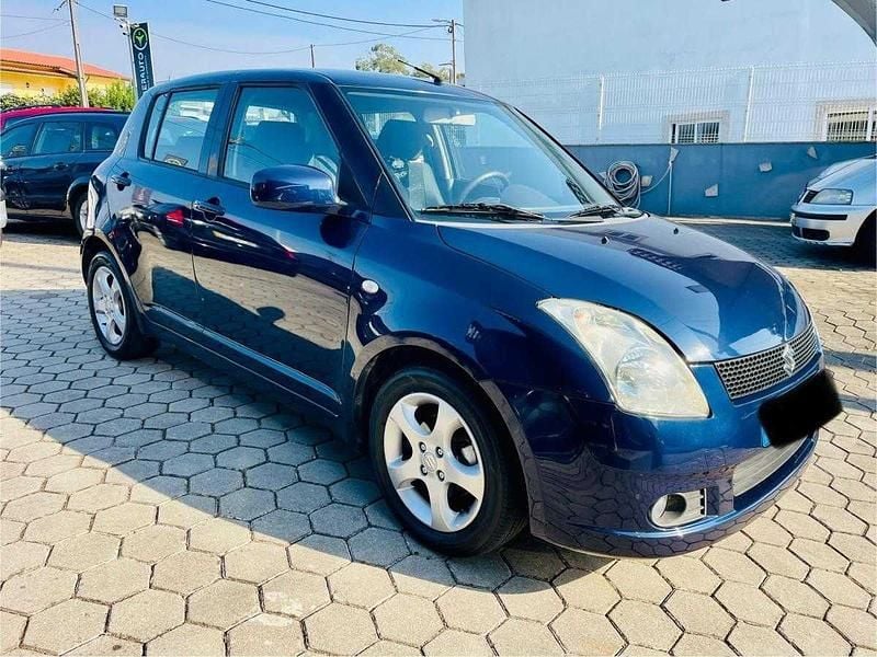 Azul Usado 2005 Suzuki Swift GLX | € 4.990 (Bom preço) - Imagem 1/4
