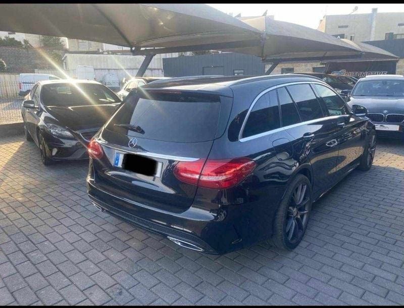 Usado Mercedes C200 136 HP (100 kW) 2015 Preto Carrinha