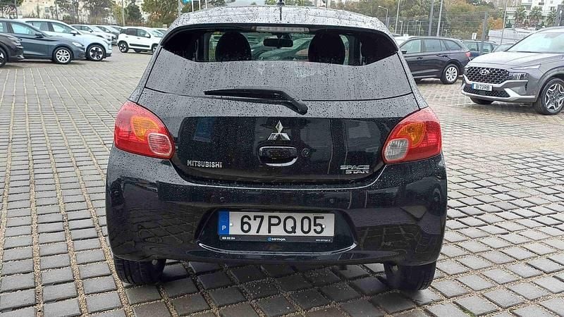 Usado Mitsubishi Space Star Intense 80 HP (58 kW) 2015 Preto