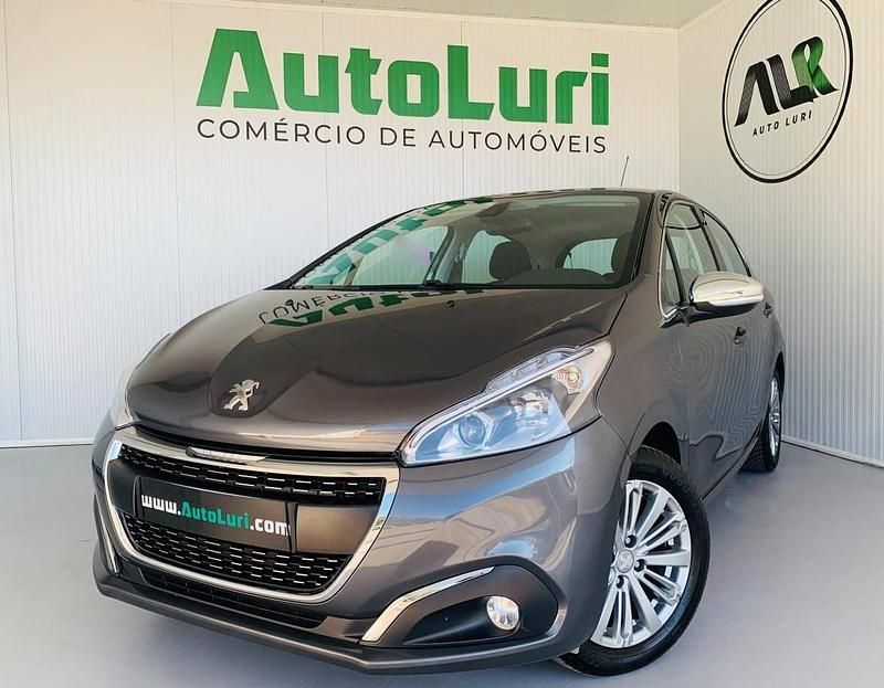 Cinzento Usado 2016 Peugeot 208 Style Citadino | € 9.950 (Preço justo) - Imagem 1/4