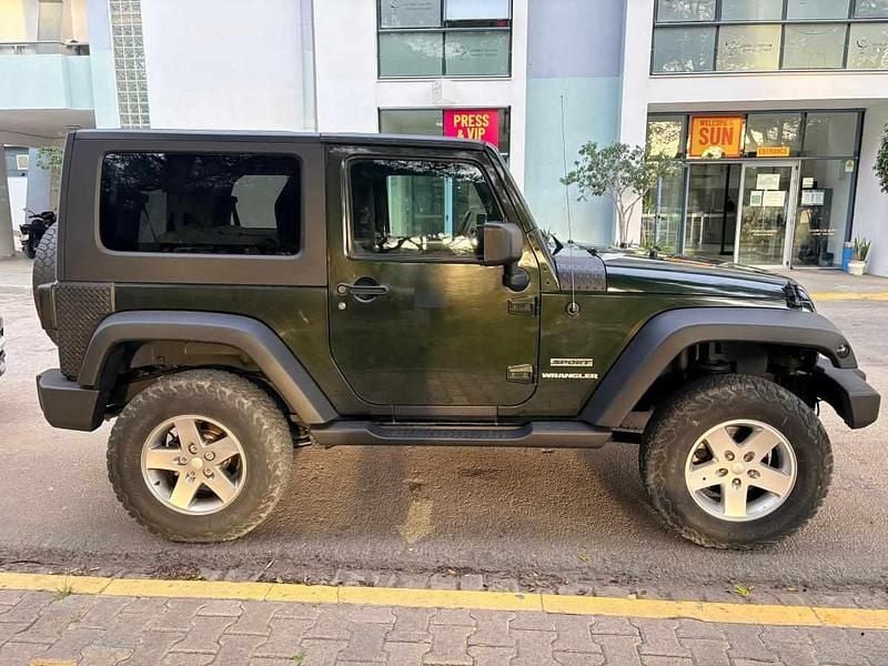 Usado Jeep Wrangler Sport 200 HP (147 kW) 2011 Verde SUV