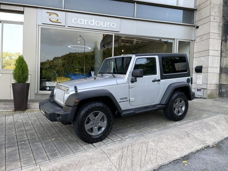 Usado Jeep Wrangler Sport 200 HP (147 kW) 2012 Cinzento preto SUV