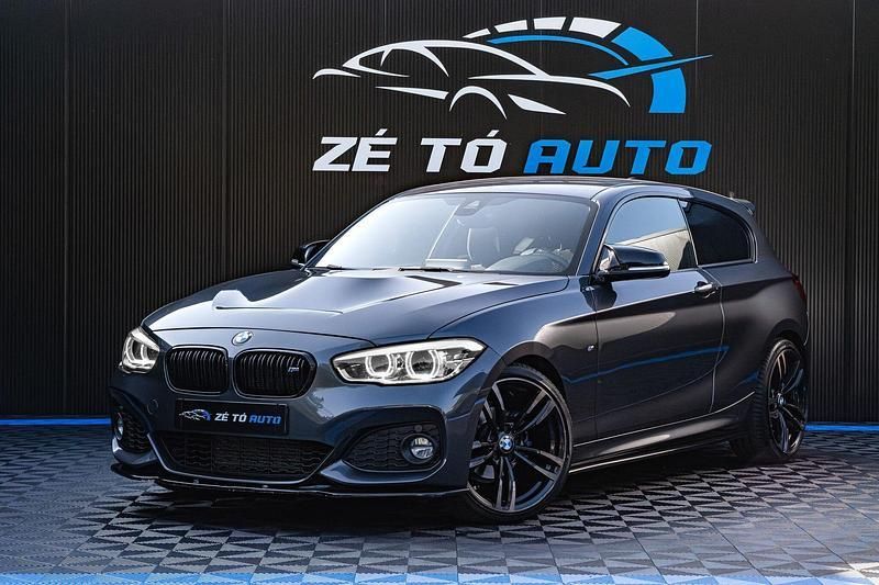 Cinzento Usado 2015 BMW 118 Citadino | € 24.900 - Imagem 1/4