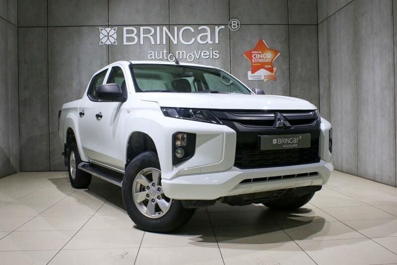 Branco Usado 2021 Mitsubishi L200 Invite Pickup | € 32.890 (Preço justo) - Imagem 1/4