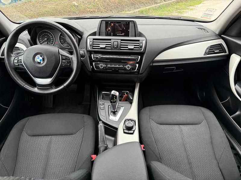 Cinza Usado 2015 BMW 116 Advantage Citadino | € 17.480 - Imagem 1/4