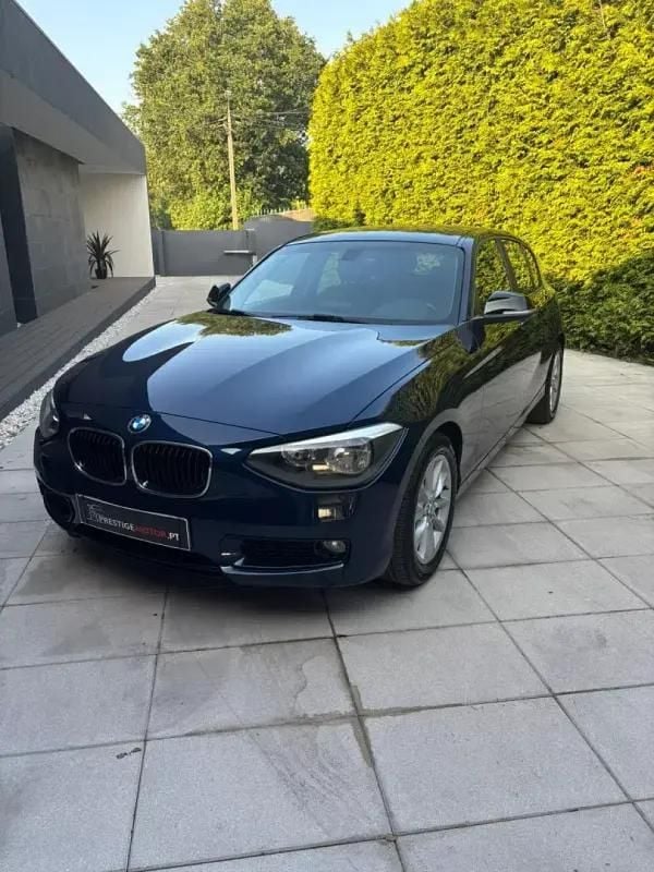 Azul Usado 2013 BMW 116 Citadino | € 12.400 (Preço justo) - Imagem 1/4