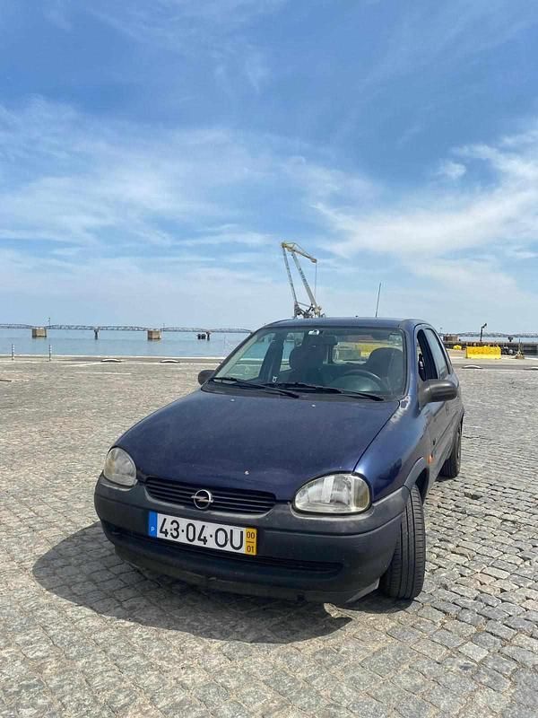 Azul Usado 2000 Opel Corsa Citadino | € 1.499 - Imagem 1/4