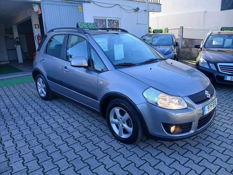 Cinzento Usado 2008 Suzuki SX4 Citadino | € 6.450 - Imagem 1/4