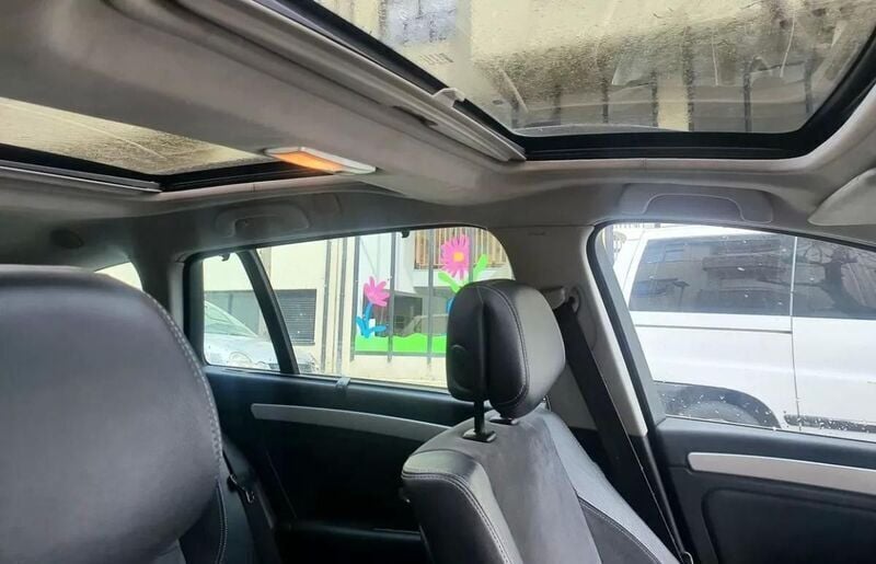 Usado Renault Laguna III Dynamique 110 HP (80 kW) 2008 Cinzento Carrinha