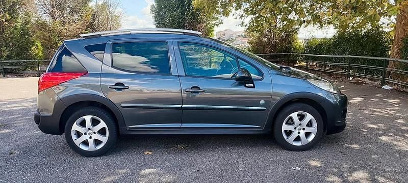 Cinza escuro Usado 2010 Peugeot 207 Outdoor Outdoor Carrinha | € 3.990 - Imagem 1/4