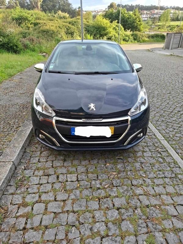 Azul Usado 2017 Peugeot 208 Citadino | € 8.500 (Preço justo) - Imagem 1/4