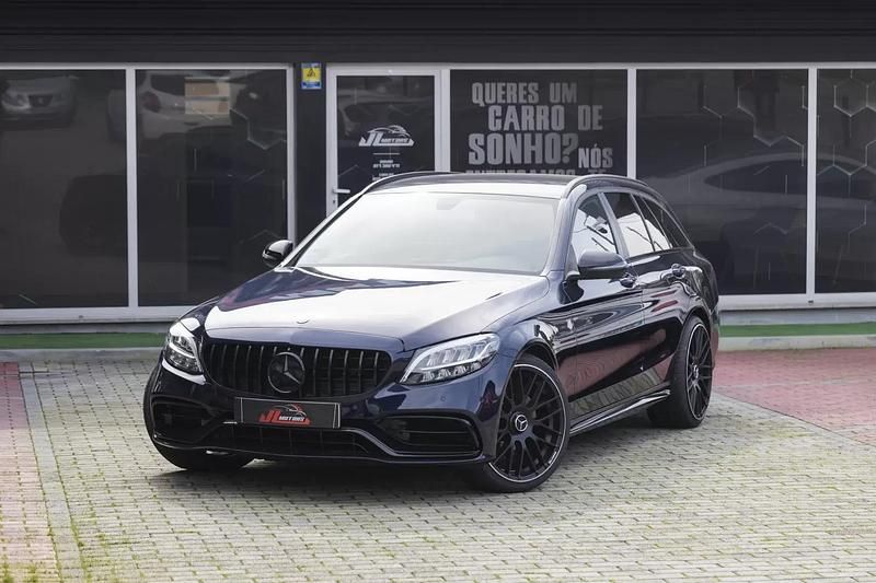 Usado Mercedes C180 AMG line 122 HP (89 kW) 2019 Azul escuro Carrinha