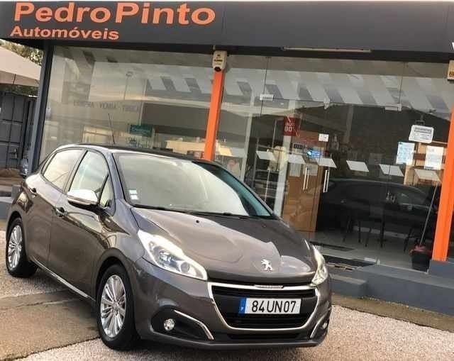 Cinza antracite Usado 2018 Peugeot 208 Style Citadino | € 14.750 - Imagem 1/4