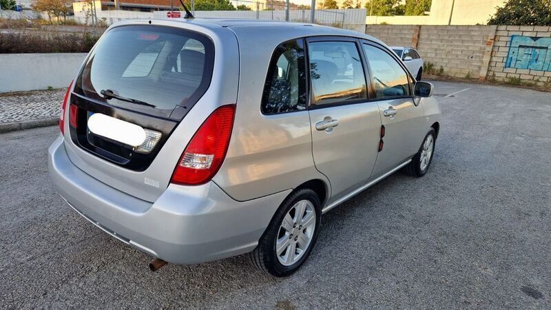 Usado 2003 Suzuki Liana Sedan | € 1.300 - Imagem 1/4