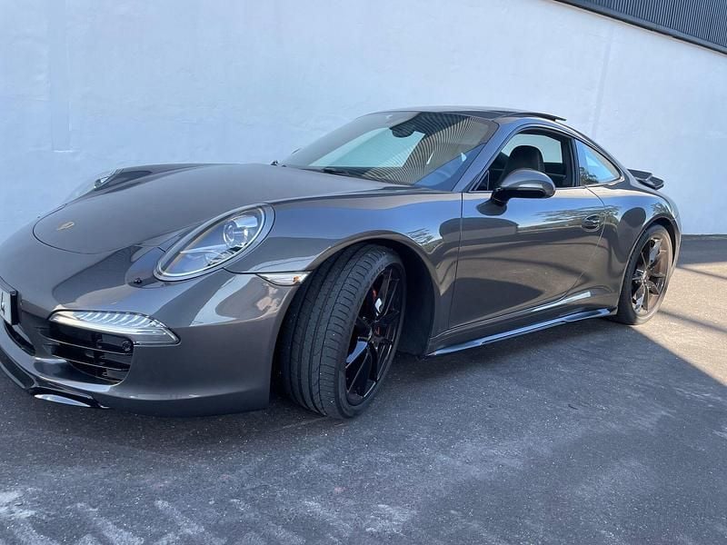 Cinza Usado 2012 Porsche 911 Carrera Coupé | € 89.500 - Imagem 1/4