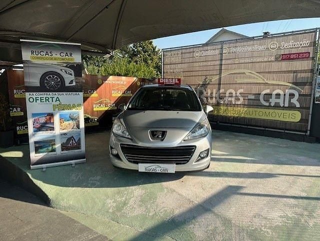 Cinzento Usado 2010 Peugeot 207 | € 8.500 (Caro) - Imagem 1/4