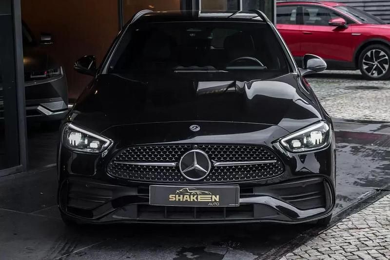 Usado Mercedes C300e AMG line 313 HP (230 kW) 2023 Preto Carrinha