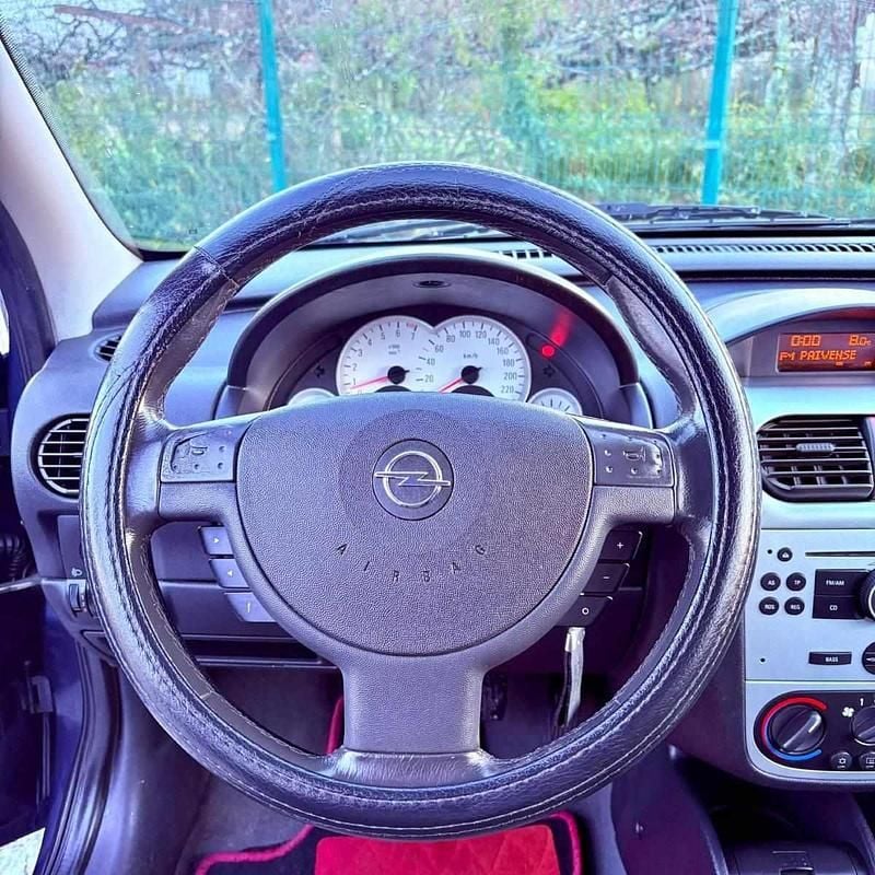 Usado Opel Corsa 75 HP (55 kW) 2006 Cinzento Citadino