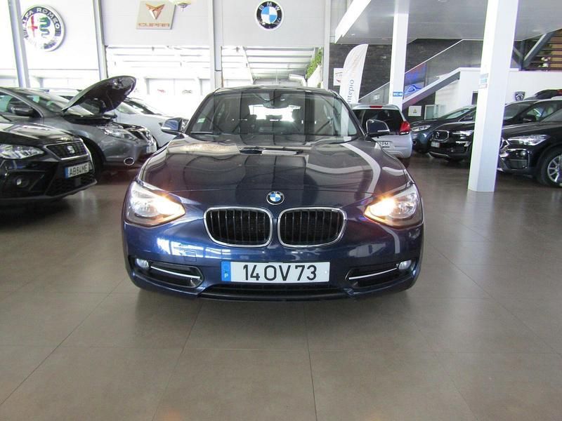 Azul Usado 2014 BMW 116 Efficient Dynamics Citadino | € 13.000 - Imagem 1/4