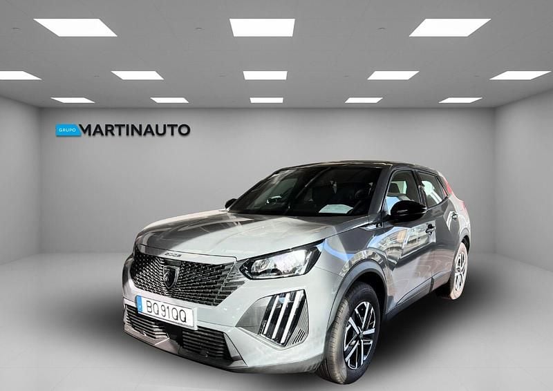 Cinza Novo 2025 Peugeot e-2008 Active SUV | € 30.000 - Imagem 1/4