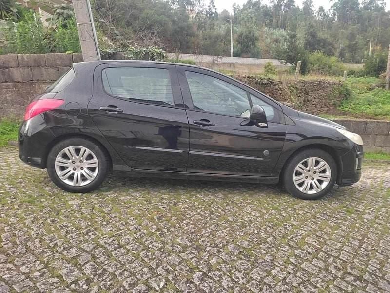 Preto Usado 2010 Peugeot 308 Citadino | € 5.999 (Preço justo) - Imagem 1/4