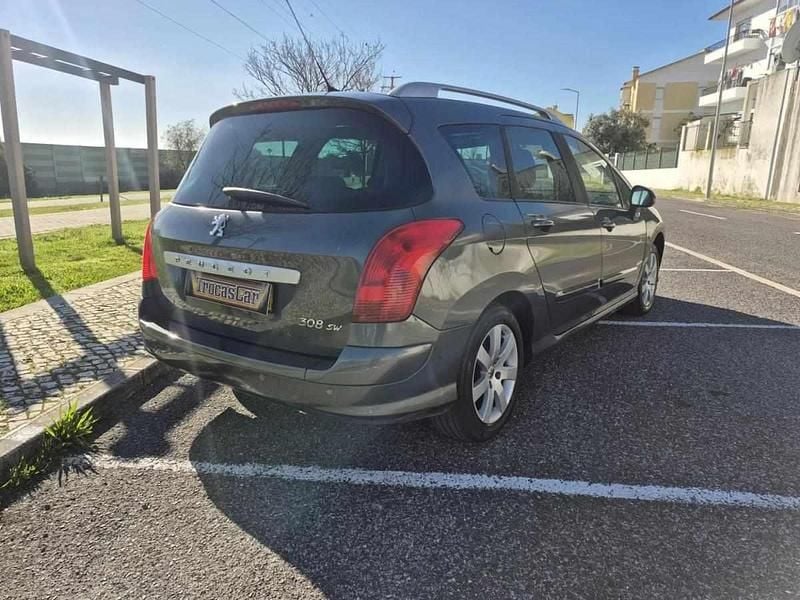 Usado Peugeot 308 SW Premium 110 HP (80 kW) 2010 Cinza escuro Carrinha