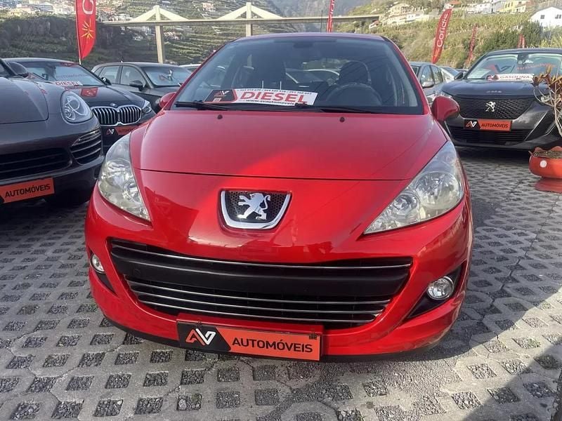 Usado Peugeot 207 68 HP (50 kW) 2010 Vermelho Citadino
