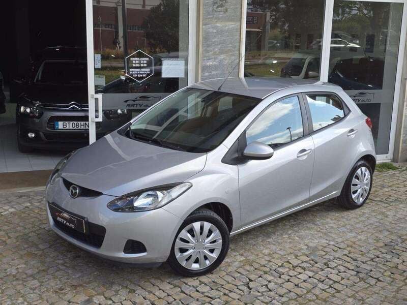 Cinzento Usado 2009 Mazda 2 Comfort | € 6.450 (Bom preço) - Imagem 1/4